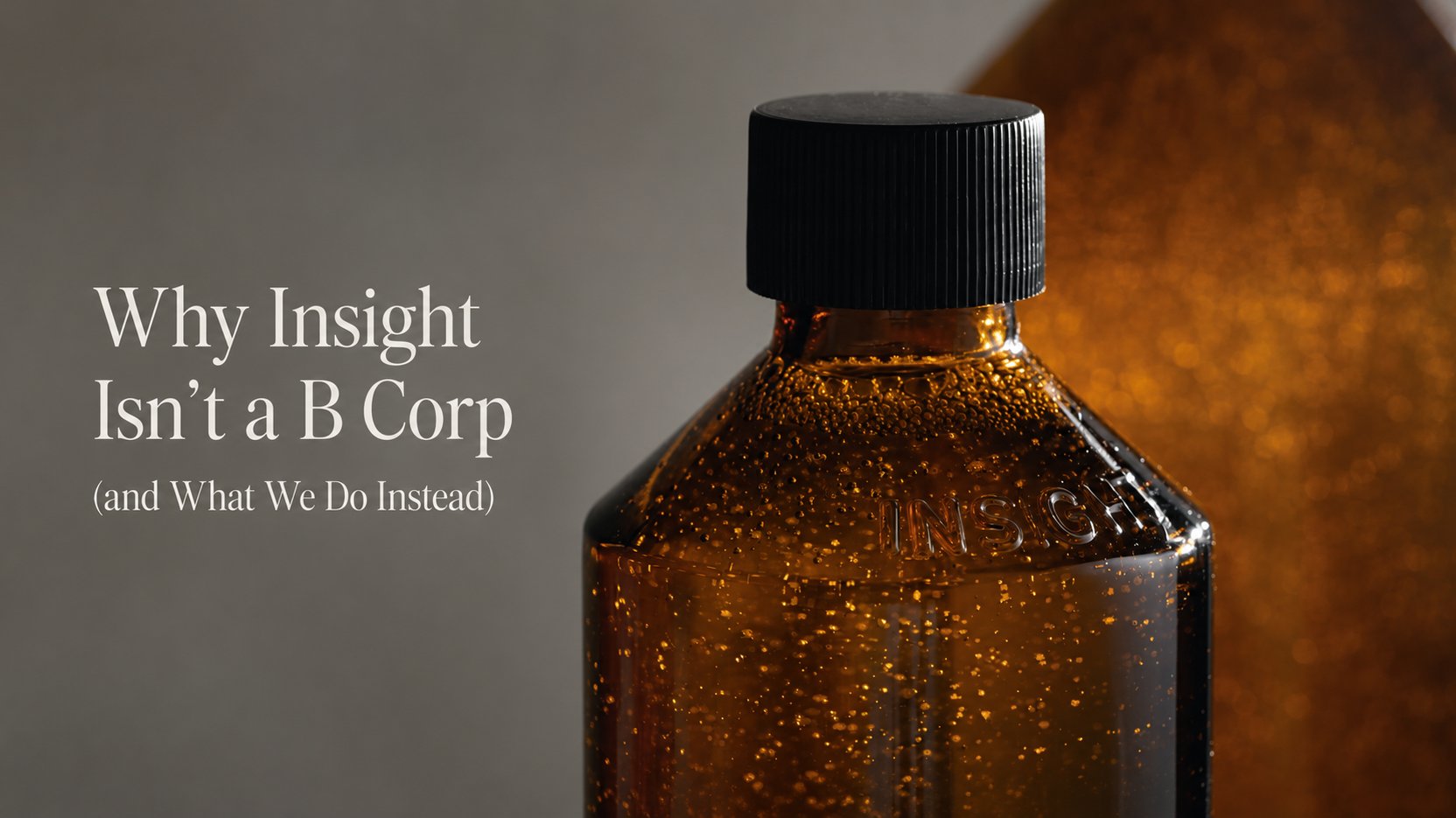 Close-up of an Insight amber bottle with the title 'Why Insight Isn't a B Corp (and What We Do Instead)', highlighting Insight's approach to sustainability and responsible professional haircare.
