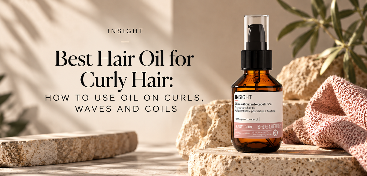 INSIGHT Elasti-Curl Bouncy Curls Hair Oil displayed on natural stone for a guide to caring for curls, waves and coils.