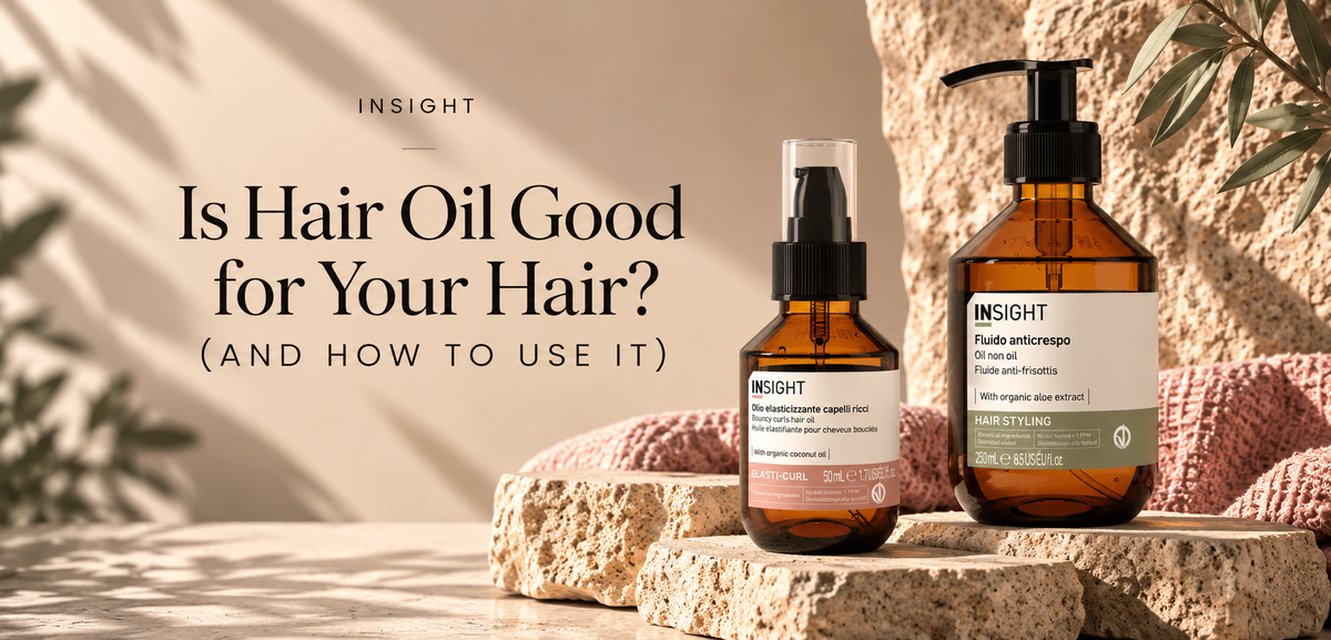 INSIGHT Elasti-Curl Bouncy Curls Hair Oil and Oil Non Oil displayed on natural stone for a hair oil guide.